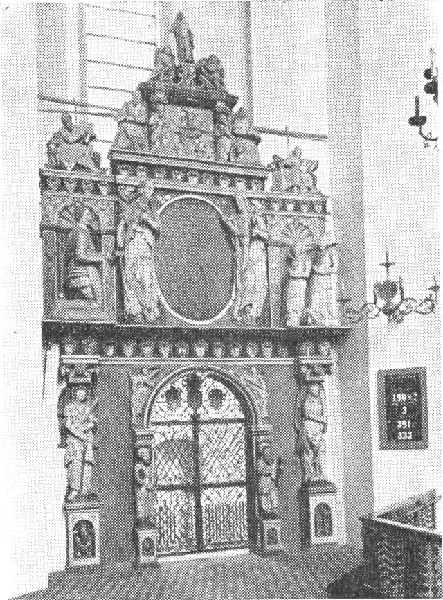 (Foto). Rigsråd Jørgen Skeels epitafium, formet som en pragtportal med smedejernsdør af Caspar Fincke.